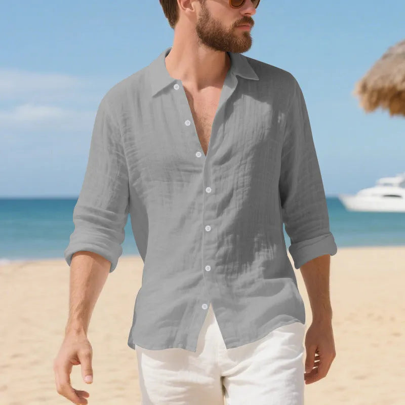 Man wearing a loose-fitting linen casual shirt in a light colour, showing the non-iron texture and American style.