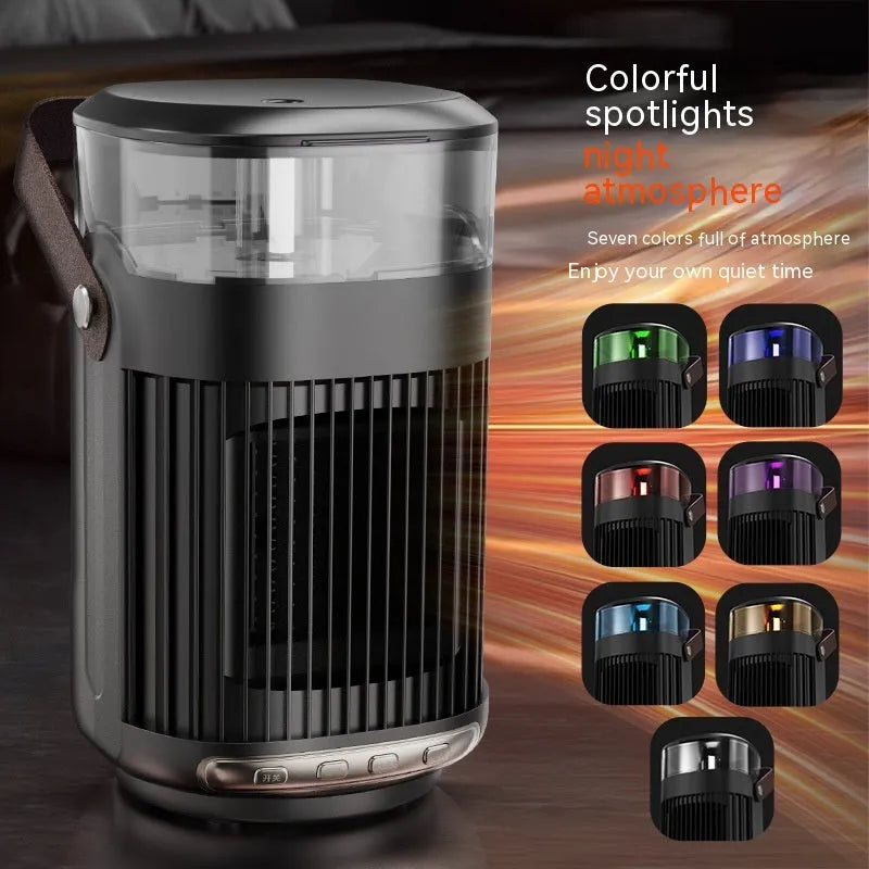 Black compact portable ceramic heater with humidifier unit on a table.