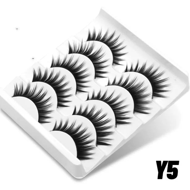 Natural false eyelashes with artificial fibre construction and included eyelash glue