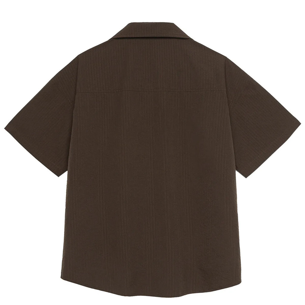 Brown striped Cuban collar short sleeve outdoor shirt laid flat.
