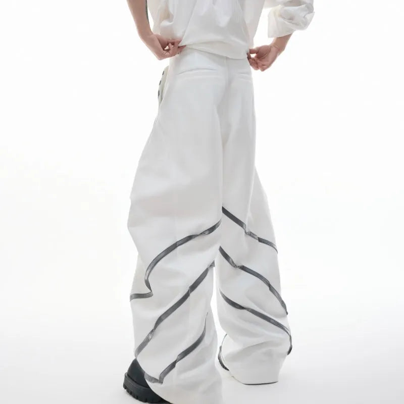 Men's trousers with metal striped rivets and pleated front in polyester fabric