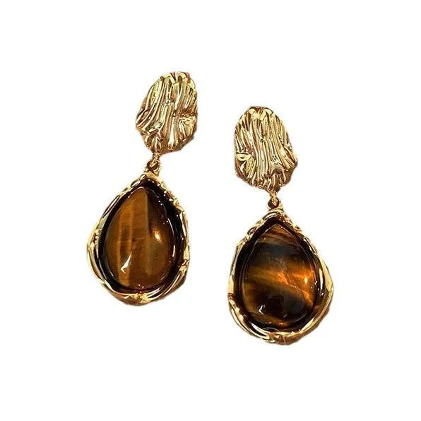 Handmade alloy holiday earrings set showing three geometric styles with tassel elements