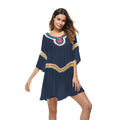 Women's crocheted white beach cover-up top for sun protection during swimming.