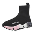 Women's black platform sock boots with cloth upper, rubber sole, round toe, thick heel, and low tube design on a neutral background