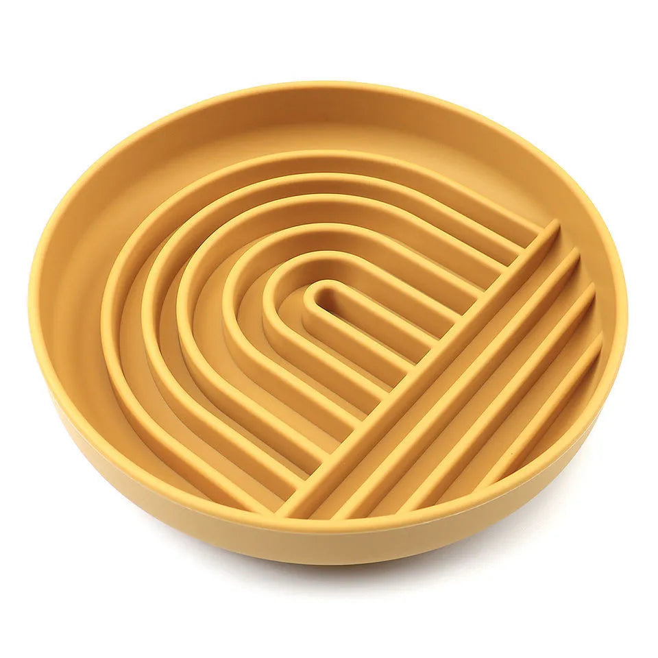 Silicone dog slow feeder bowl with ridges, shown in mustard green colour