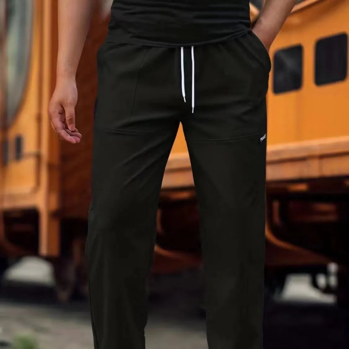 Men's casual polyester trousers for spring and autumn in various colours including light gray and black