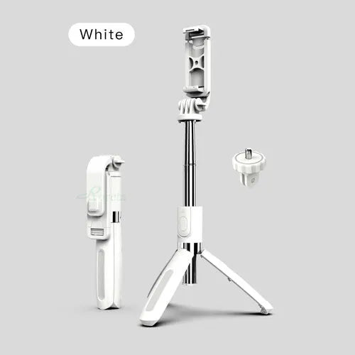 Extended black Bluetooth selfie stick with phone attached, showing remote control and folded tripod legs.