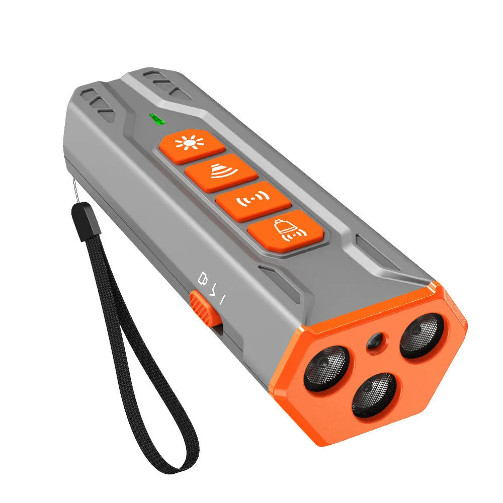 Three-head ultrasonic dog trainer with remote control in grey and orange colour scheme.