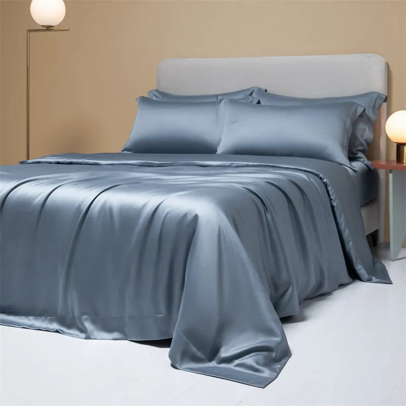 Luxury Tencel Lyocell bedding set with quilt cover, sheet, and pillowcases in grey.