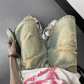 Blue retro denim shorts for men with ripped detail, loose five-points fit, and button fly closure.