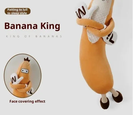 Banana King sleeping soft pillow toy in yellow plush with curved shape on a neutral background
