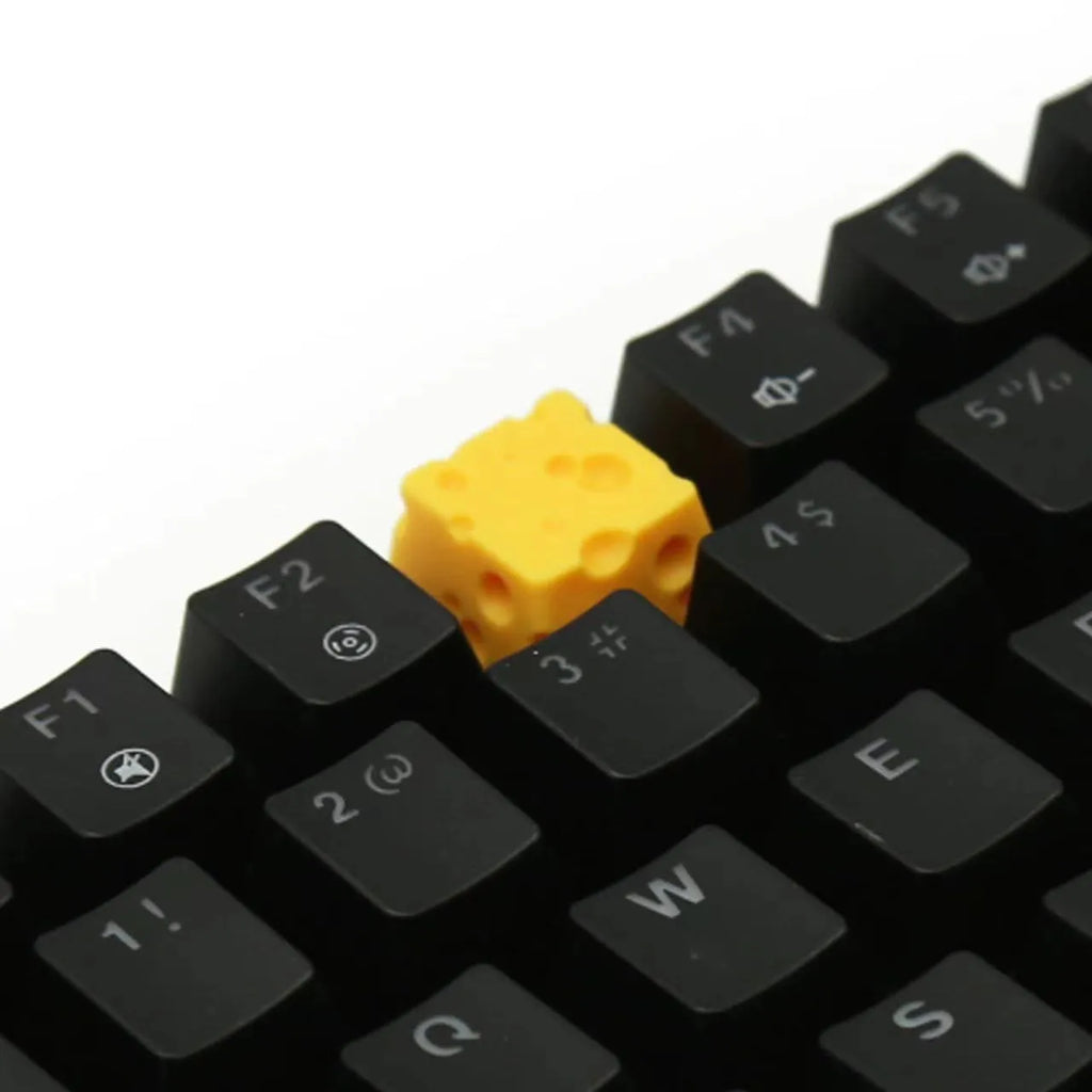 Yellow resin cheese wedge key cap for mechanical keyboards with detailed sculpting