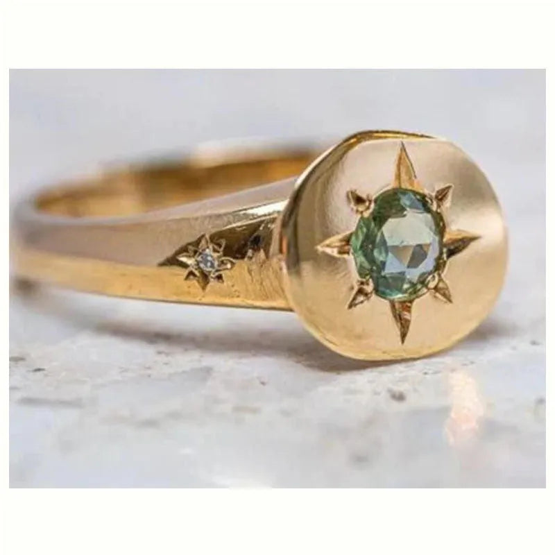 Golden adjustable ring with oval asterism zircon and star design on zinc alloy band