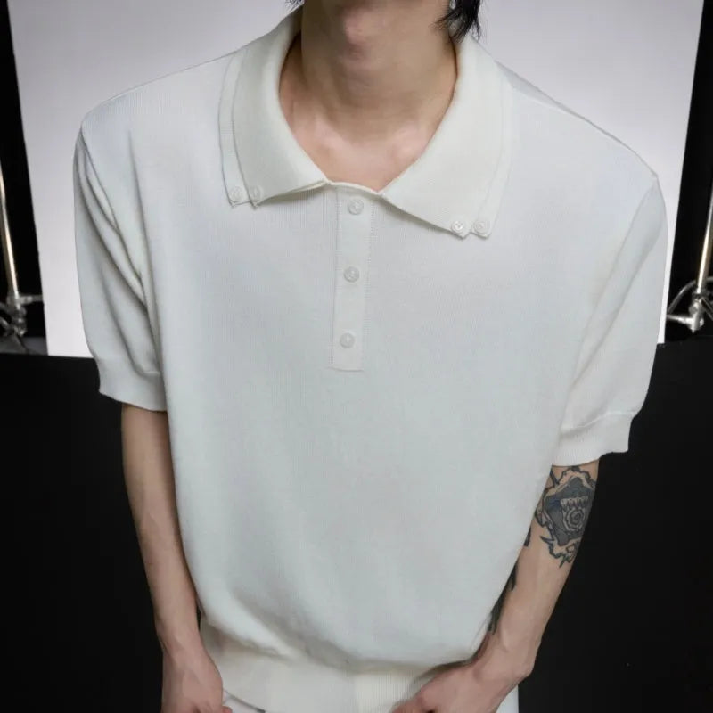 Man wearing a grey double collar lapel short sleeve polyester knit shirt in a loose fit