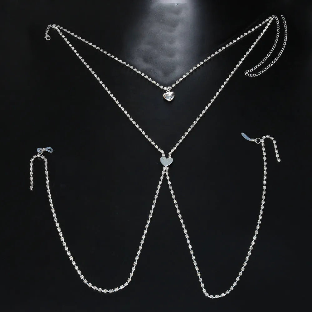 Women's rhinestone body chain with heart shape in gold or silver colour with electroplated finish