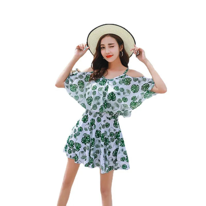 Women's printed one-piece swimsuit in polyester with green leaf or black letter style options