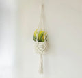 Hand-woven minimalist flower pot in polyester cotton fabric shown in brown colour