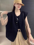 Women's loose-fit short polyester vest in milky white with pocket detail.