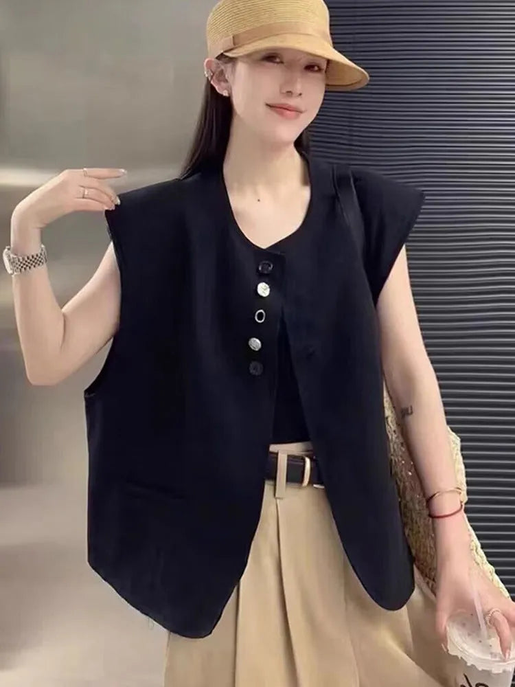 Women's loose-fit short polyester vest in milky white with pocket detail.