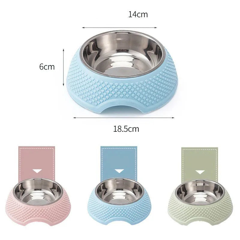 Blue stainless steel pet bowl with non-slip base on a table