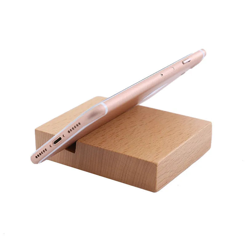 Decorative resin mobile phone stand in a choice of styles including animal figures and wood-effect designs.