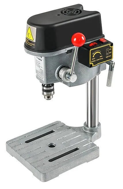 Mini bench drill and milling machine on a workbench with cross bench pliers and heavy-duty pliers.