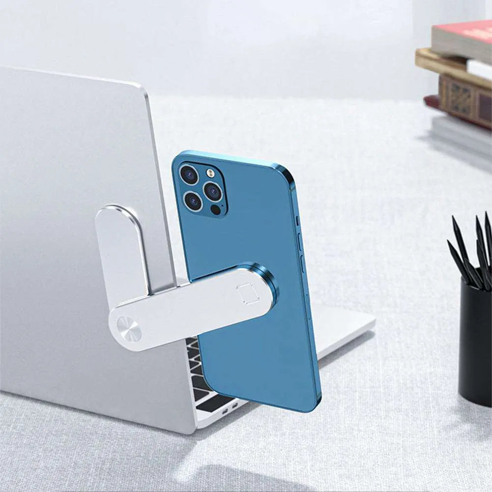 Black aluminium laptop phone holder with magnetic mount attached to computer monitor side