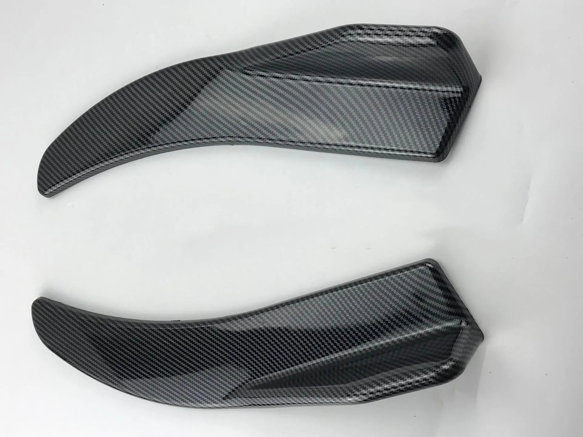 Pair of bright carbon fibre effect front and rear car deflectors for General Motors vehicles