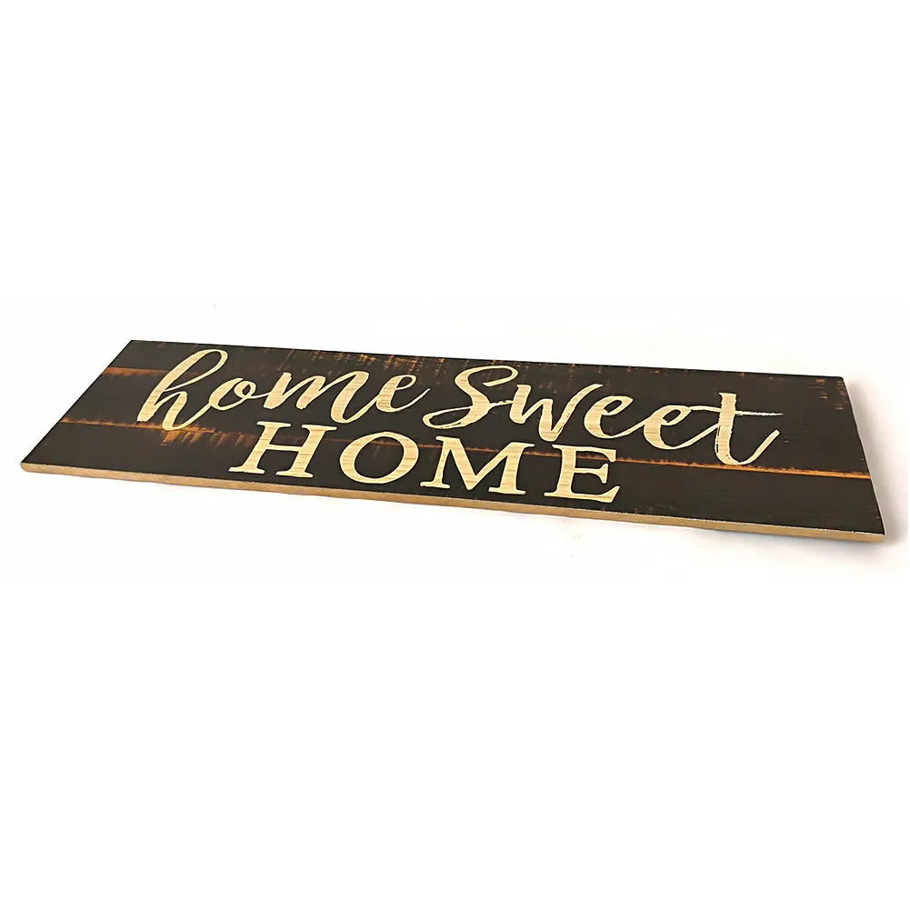Carved wooden wall pendant decoration measuring 40cm long in black or white colour option