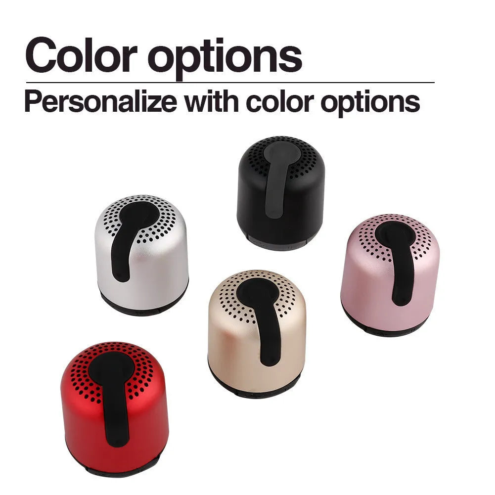 Hieha small cylindrical metal Bluetooth speaker in black, gold, pink, red or silver colour.