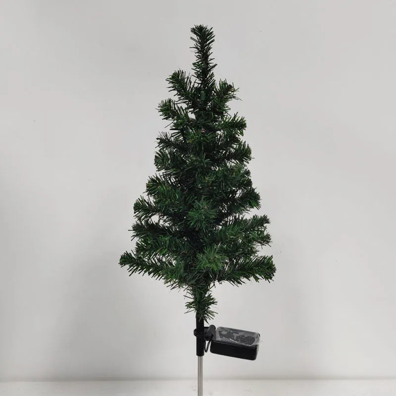 Solar Christmas tree lamp garden decoration with IP65 ABS construction placed in outdoor courtyard