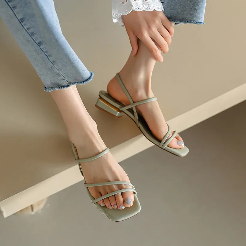 Women's flat open-toed Roman sandals with square toe and ankle strap in microfiber material