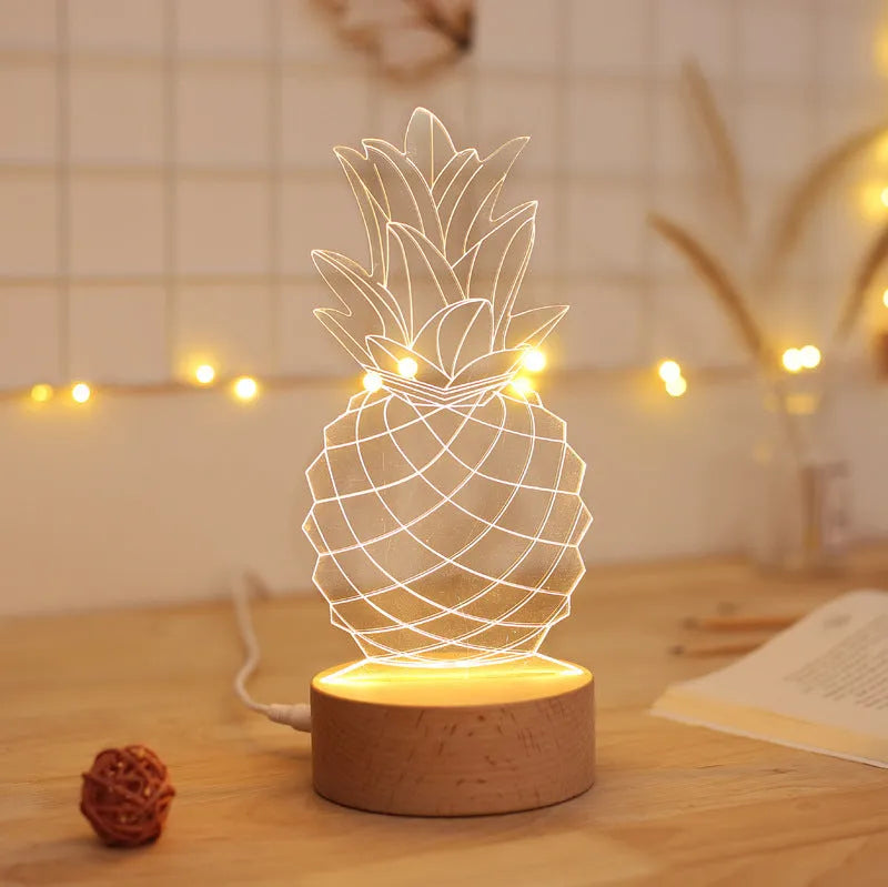 Cartoon pineapple shaped bedside table lamp with wooden base and acrylic body on a white surface.