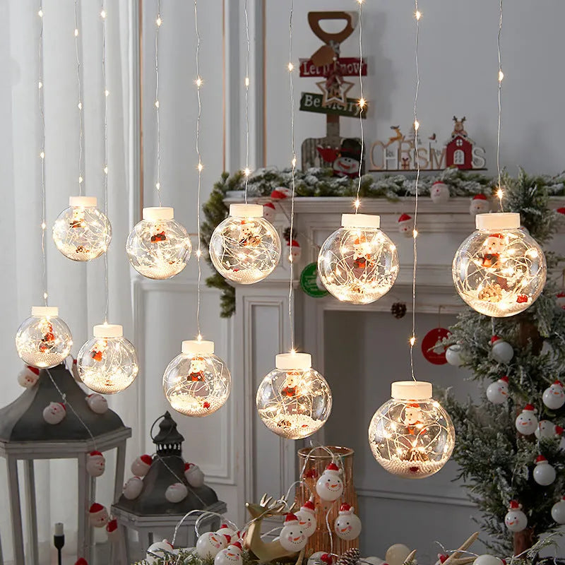10-piece LED Christmas curtain light set with snowman, tree, and Santa ornaments for window decoration