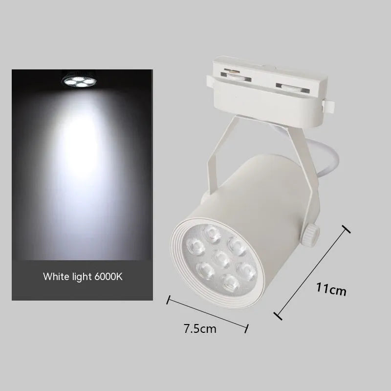 LED track spotlight with open-mounted slide design on black aluminium shell