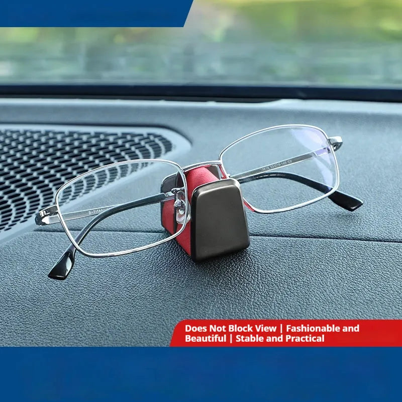 Zinc alloy and leather car dashboard clip for holding glasses in black, grey, green, or red.