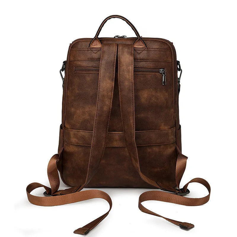 Retro college student backpack in solid colour with curved shoulder straps and stitching detail