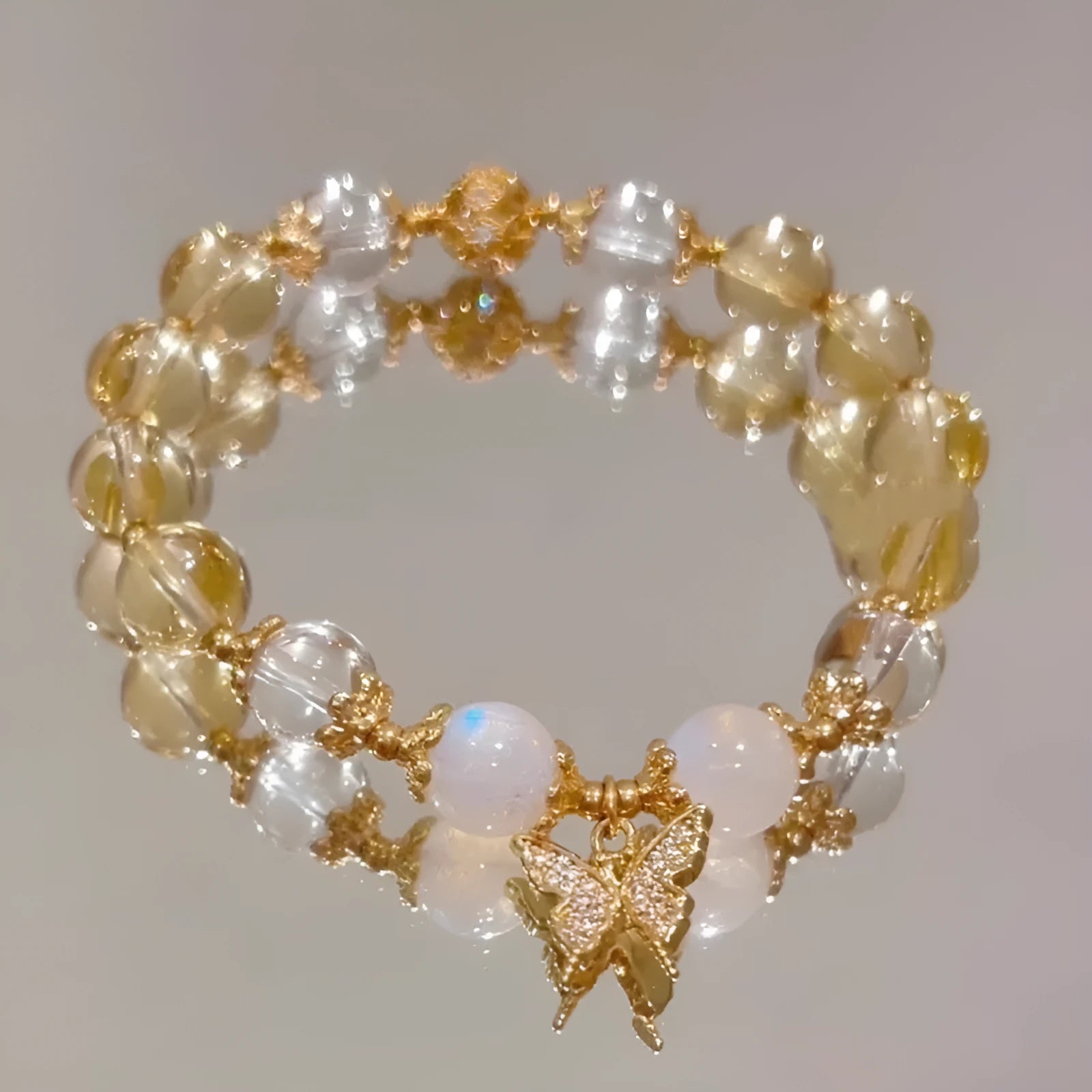 Women's moonstone white crystal beaded bracelet with Chinese style design and citrine butterfly pendant
