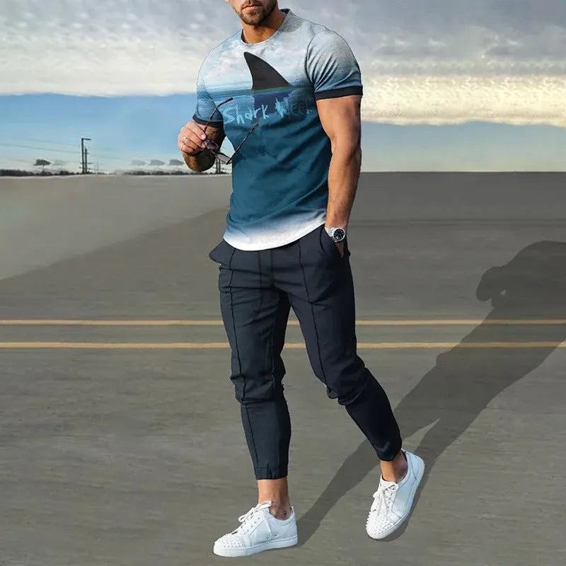 Men's short sleeve round neck T-shirt and matching trousers set in a light grey colour.