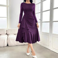 Purple women's long sleeve dress with round neck, mid waist, and ruffle trim.