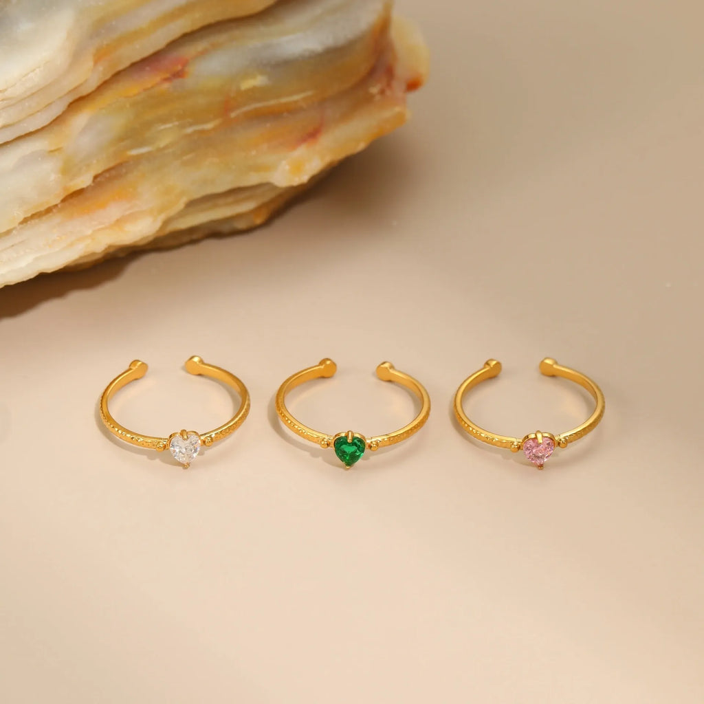 Open-ended stainless steel ring with heart-shaped zircon accents in adjustable free size design