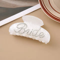 Acrylic hair clip with spot drill decoration in pink or white, 10cm long.