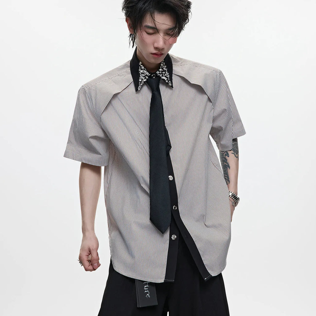 Man's blue patchwork striped shirt with a diamond tie front, quilted panels, and button decorations.