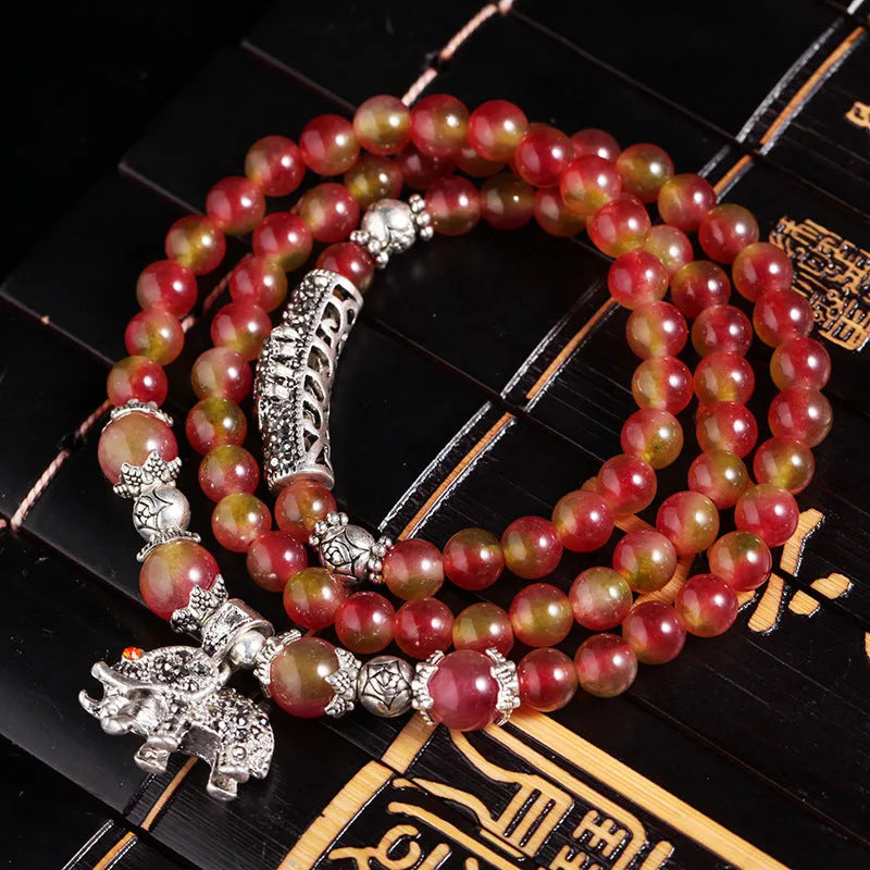 Natural watermelon crystal bracelet with Chinese knot design in 6mm and 8mm bead sizes