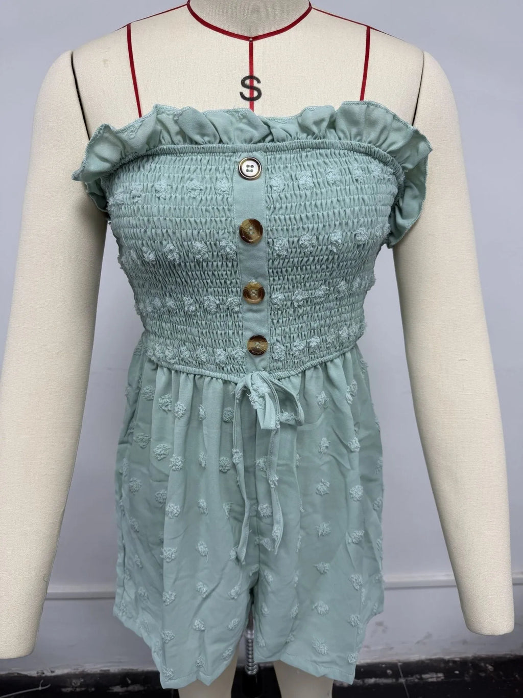 Women's off-shoulder sleeveless jumpsuit in blue solid colour with button detail