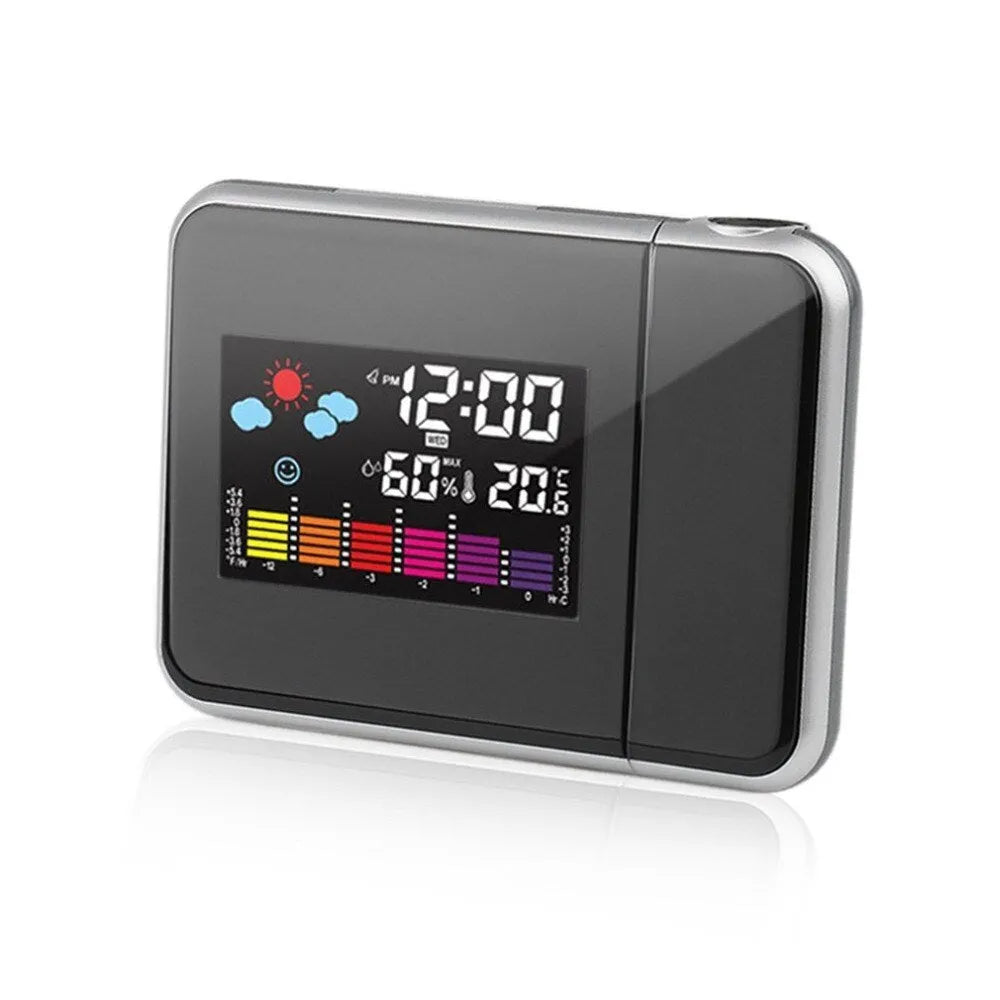Black digital projection alarm clock with LED display showing temperature and humidity readings