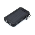 Black solar power bank with dual LED headlights showing 20000mAh capacity label