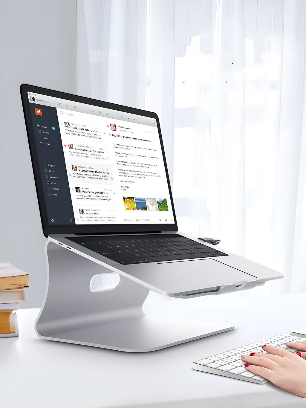Aluminium notebook cooling bracket in grey colour with rotary adjustment mechanism.