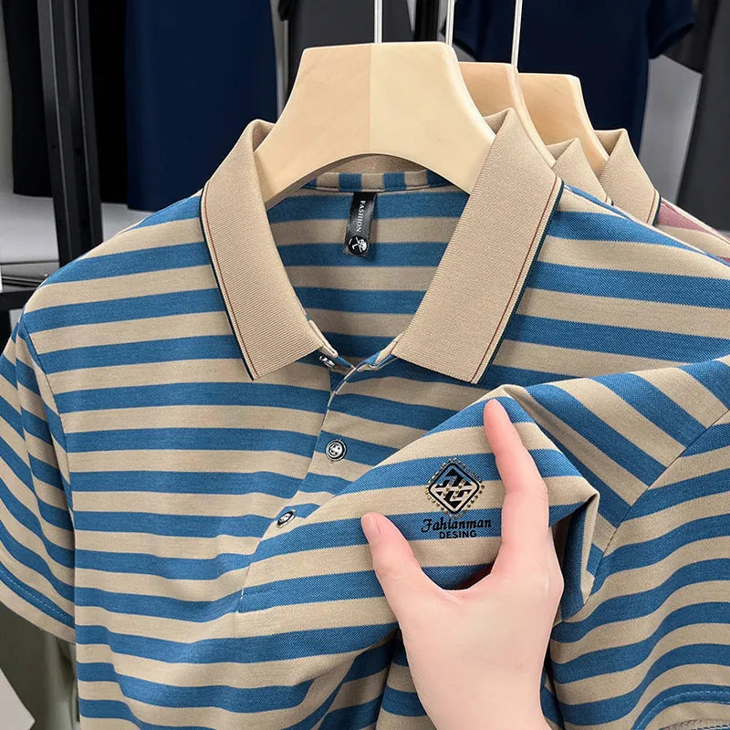 Man modelling a red striped short sleeve casual shirt with mosaic pattern detail.