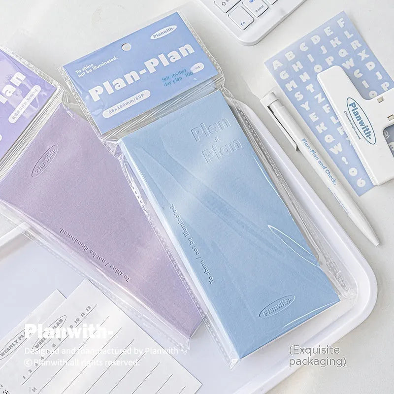 Embossed A5 daily meter notebook showing paper cover and open pages